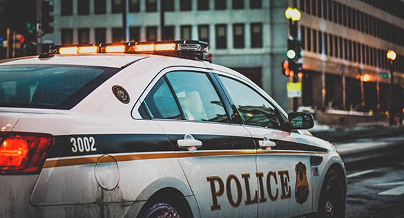 Picture of a police car on a city street